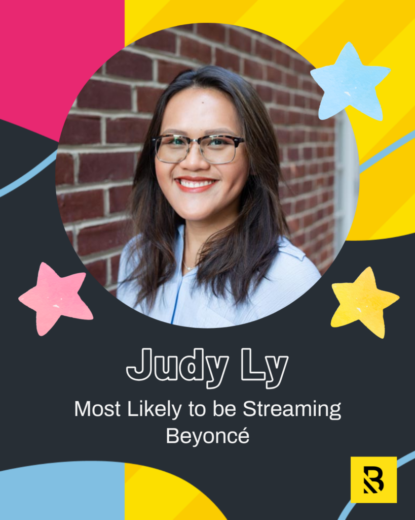 A smiling woman with glasses and long brown hair is shown in a circular frame against a brick wall. The graphic reads Judy Ly, Most Likely to be Streaming Beyoncé, as part of Inside the Hive Staff Superlatives, with colorful stars and shapes in the background.
